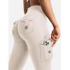 imageYEOREO CoreFlex Women Workout Flare Leggings with Pockets Hidden Scrunch High Waisted Cargo Gym Yoga No Front Seam LeggingsLight Khaki