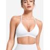 imageYEOREO Sports Bras for Women Strappy Padded Halter Ericie Open Back Light Impact Deep V Neck Yoga Workout Gym TopsWhite