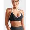 imageYEOREO Workout Sports Bras for Women Padded Strappy Open Back Gym Bra Light Impact Criss Cross Yoga Crop TopBlack White