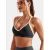 imageYEOREO Workout Sports Bras for Women Padded Strappy Open Back Gym Bra Light Impact Criss Cross Yoga Crop TopBlack White