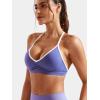 imageYEOREO Workout Sports Bras for Women Padded Strappy Open Back Gym Bra Light Impact Criss Cross Yoga Crop TopDark Purple White