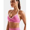 imageYEOREO Workout Sports Bras for Women Padded Strappy Open Back Gym Bra Light Impact Criss Cross Yoga Crop TopPink White