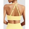 imageYEOREO Sports Bras for Women Open Back Workout Gym Bra Padded Medium Impact Yoga Tops with Ajustable Back StrapsMilk Yellow
