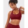 imageYEOREO SoftHue Women Halter Sports Bra Workout Seamless Padded Basic Bra Open Back Yoga Gym Crop TopScarlett Red