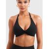 imageYEOREO Halter Sports Bras for Women Low Impact Removable Padded Adgustable Front Twist Deep V Seamless Workout Gym TopsBlack