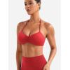 imageYEOREO Halter Sports Bras for Women Strappy Backless Impact Removable Pads Adjustable Deep V Bra Workout Gym Yoga Crop TopRed