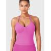 imageYEOREO SoftHue Impact Longline Strappy Top Womens Halter Workout Tank Tops Backless Gym Longline with Adjustable StrapFlower Powder