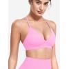 imageYEOREO Sports Bras for Women Strappy Padded Halter Ericie Open Back Light Impact Deep V Neck Yoga Workout Gym TopsPink