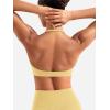 imageYEOREO Halter Sports Bras for Women Adjustable Strappy Open Back Impact Removable Pads Deep V Bra Workout Gym Yoga Crop TopCreamy Yellow