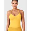 imageYEOREO SoftHue Impact Longline Strappy Top Womens Halter Workout Tank Tops Backless Gym Longline with Adjustable StrapYellow