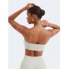 imageYEOREO Strapless Bandeau Sports Bra for Workout Seamless Tube Top Gym Padded Wireless BraBeige